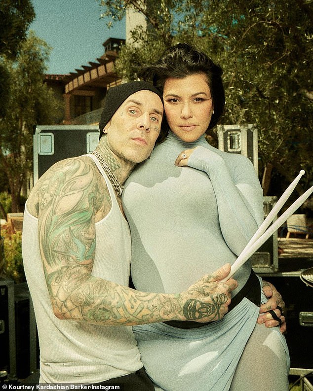 oh baby!  Kourtney and husband Travis Barker are expecting their first child together