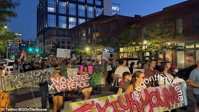 Hundreds of angry protesters marched Sunday night through Columbus, Ohio — the same city where the mother-of-two was murdered last month