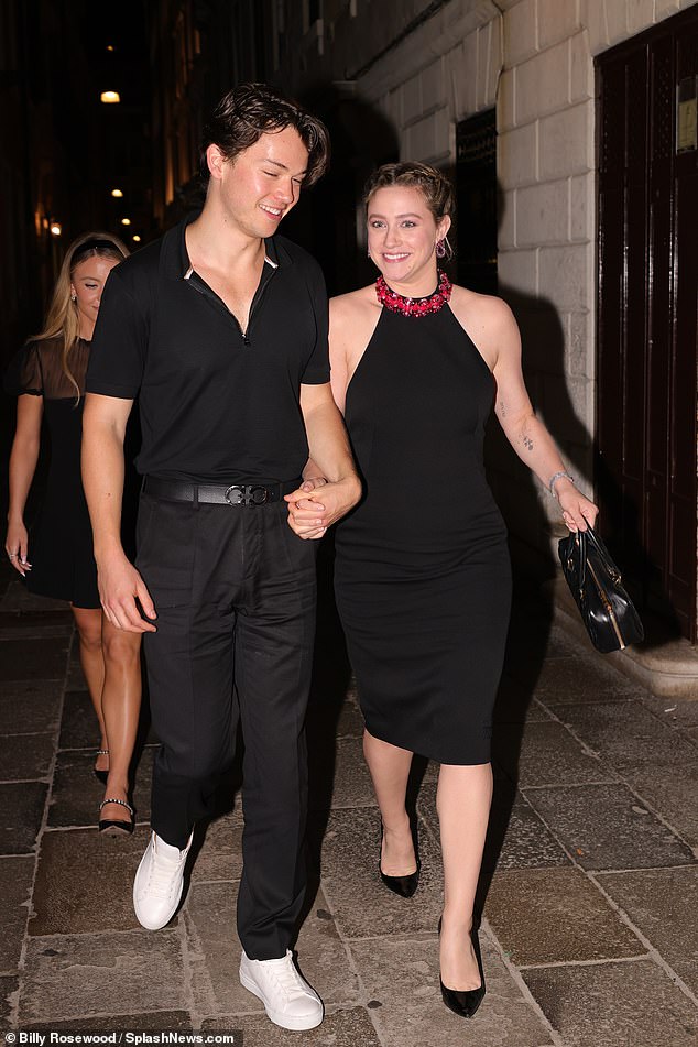 Looks good!  Lili, 26, and her boyfriend, 26, also looked equally enchanted as they went out holding hands