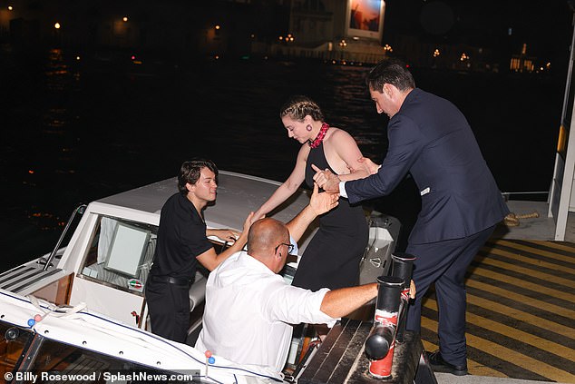 Everyone on board!  Jack helped his lover when she got on the boat