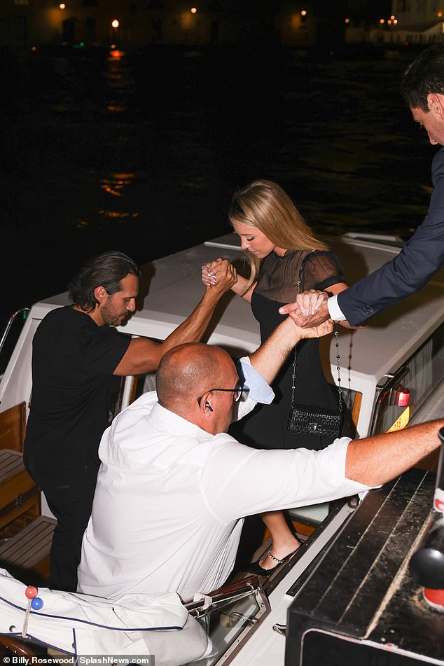 This way!  Jonathan also helped his fiancé when she climbed onto the boat