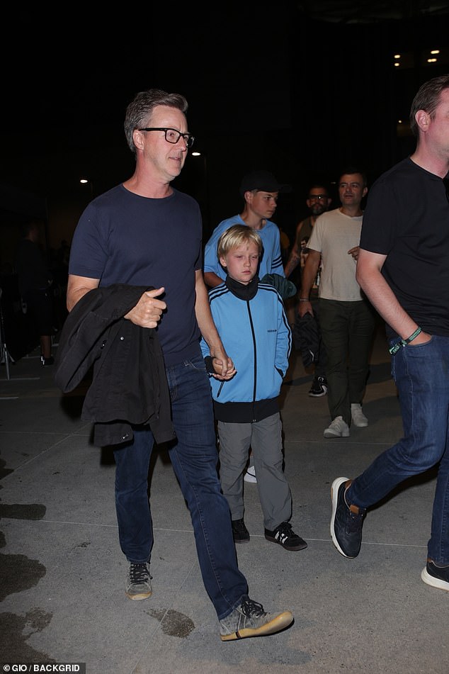 Family time!  Edward Norton was spotted leaving the game with his son