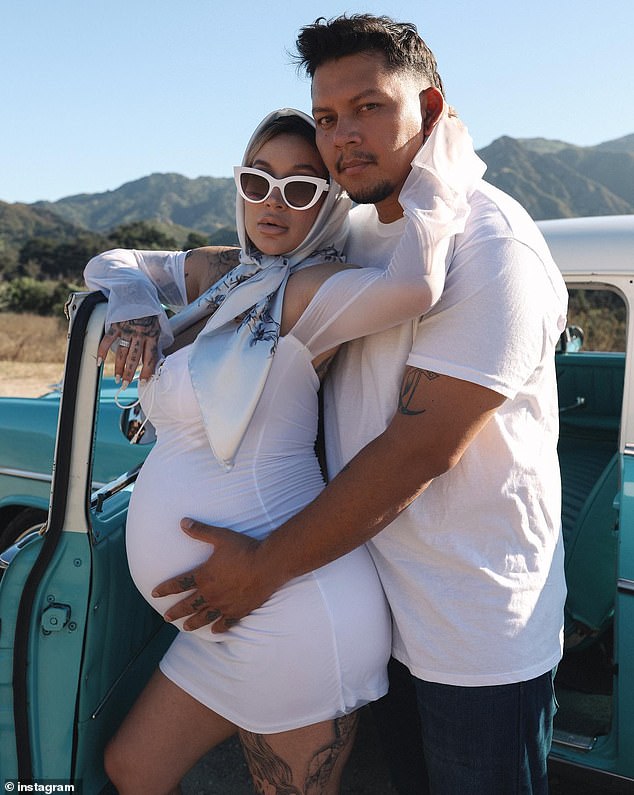 On Sept. 1, Cassie posted the couple's stylish maternity shoot, in which she wore a tight white dress and pumps with a striking hair scarf and sunglasses.