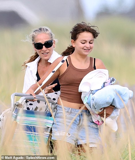Time to bond: Over Labor Day weekend, the Sex and the City actress, 58, took her 13-year-old twin daughters Tabitha Hodge and Marion Loretta Elwell to the beach for a well-deserved day of relaxation