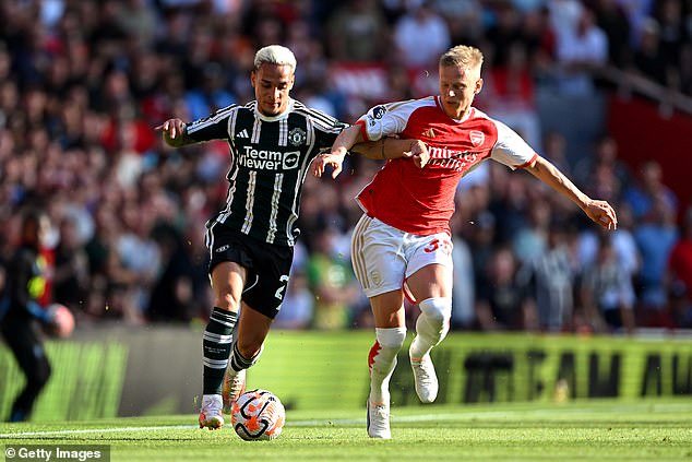 Antony (left) played for Manchester United in the defeat against Arsenal on Sunday afternoon