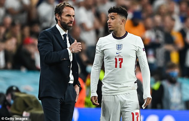 Mail Sport understand Gareth Southgate (left) and his coaching staff have spoken about the problem of Sancho sulking if he is not selected in the England line-up