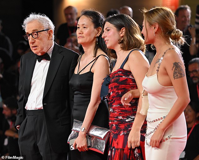 Say cheese: The family gathered on Monday night as they posed for photos in Venice