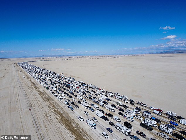 Traffic lines stretched to the horizon on Monday as thousands of people tried to leave