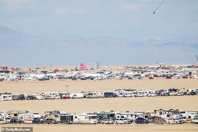 Rows of traffic snake through the desert on Monday as festival goers try to leave