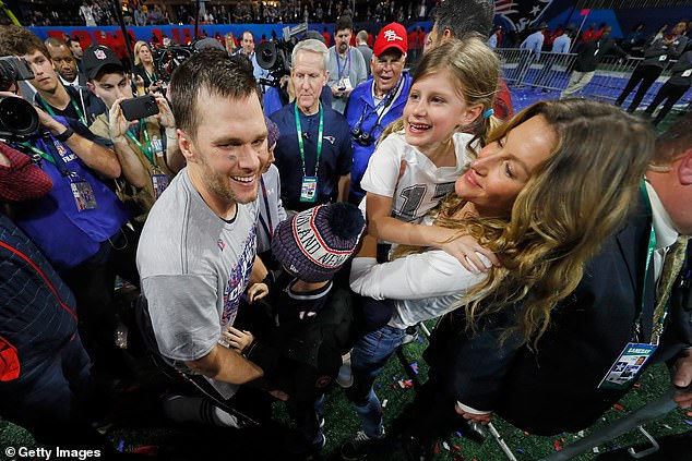 Benjamin (below) celebrates with Brady after winning the 2019 Super Bowl in Atlanta