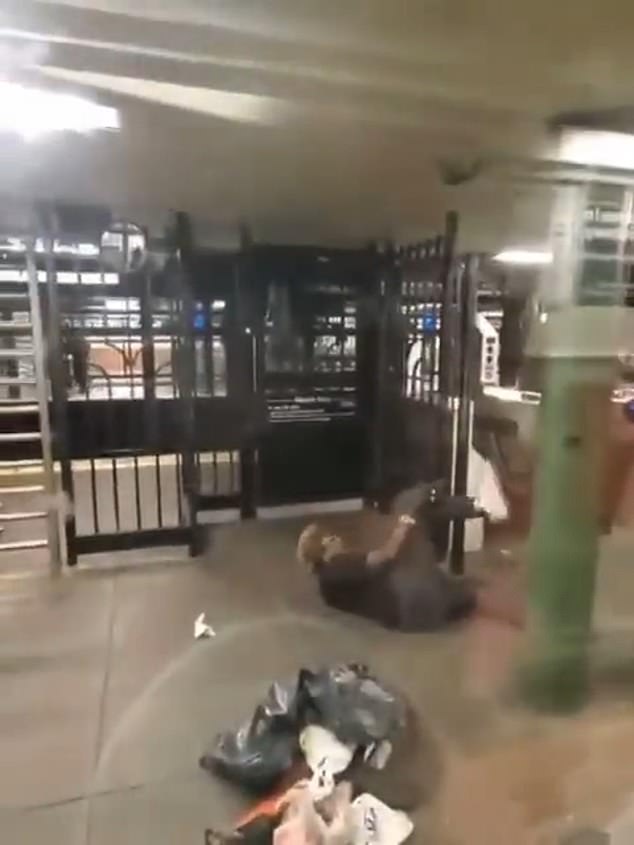 Before the video ended, the woman just lay still on the floor as the man continued to kick her