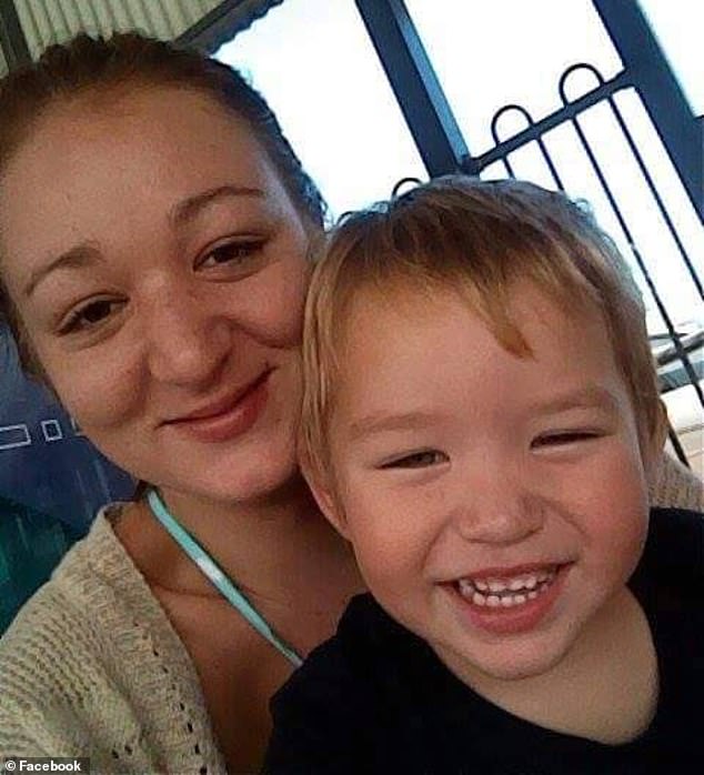 Samantha Stephenson (pictured with one of her five sons) could only watch as her house burned down with her partner and children inside