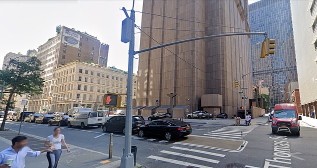 Surrounded by other normal-looking buildings, 33 Thomas Street sticks out like a sore thumb and towers into the sky