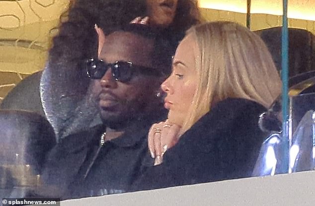 Close: The singer, 35, was joined by her fiancé Rich Paul as the pair sat in a VIP box to watch the star-studded concert at Sofia Stadium with their friends