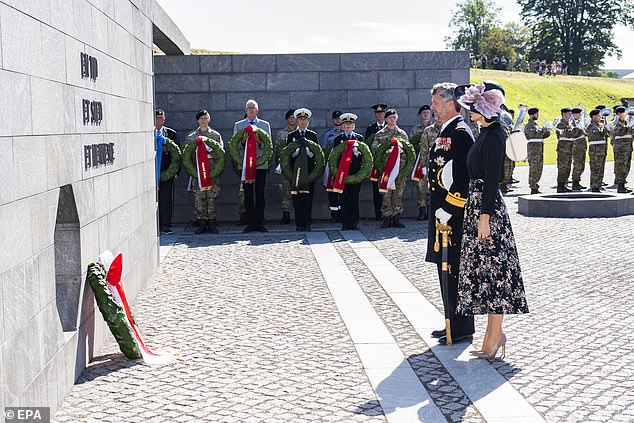 In honor of people who are or have been sent on missions by Denmark, the service was also attended by veterans.  The royal couple is pictured standing in front of the Monument to Denmark's International Effort since 1948