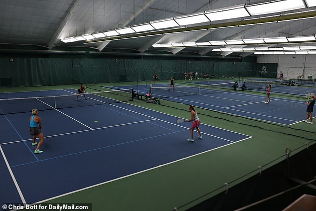 Vivek and his friend Corey Ingle played tennis at the Queen City Racquet and Fitness Club