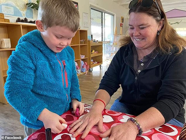 Max's mum Emma Whybird (pictured together above) said she had to 'hold him while he passed away'