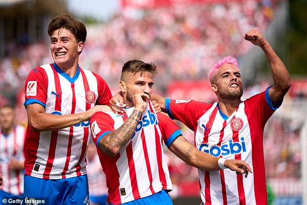 Girona celebrate their victory over Las Palmas and are second in the LaLiga standings