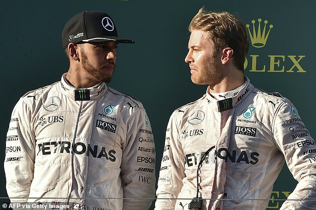 Stewart also claimed Hamilton lost the 2016 title to a driver 'who isn't the most talented' in Nico Rosberg (right)