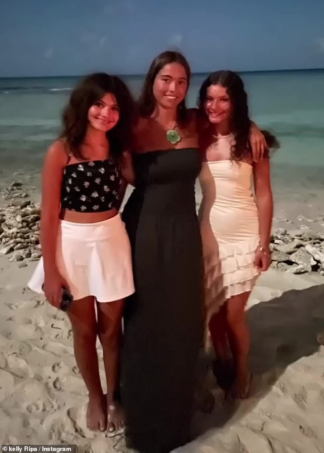 Sweet snap: She also posted a picture of Lola wearing a long black maxi dress and standing on the beach with her cousins