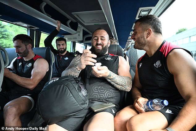 The Georgians are so big that even the bus driver notices as he transports them to training