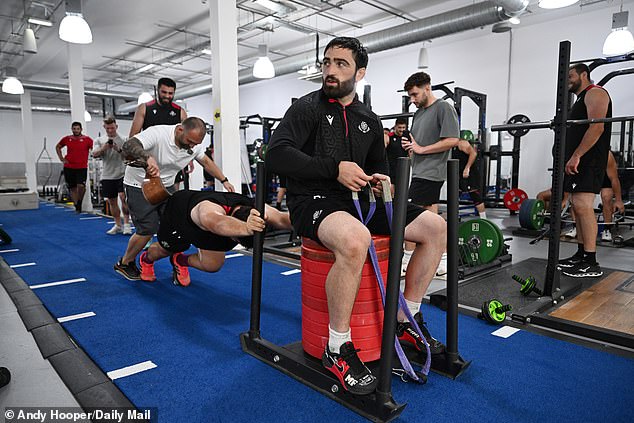 Beka Saghinadze makes Luka Japaridze's life harder by sitting on the 250kg sled he pushes