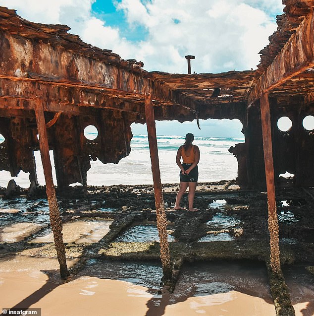 Tourists are accused of flouting rules to take a picture with the wreck (pictured)