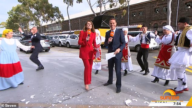 The segment featured traditional Greek dancers and signs being smashed as part of a giveaway for one lucky viewer's chance to win a trip to the Greek islands.