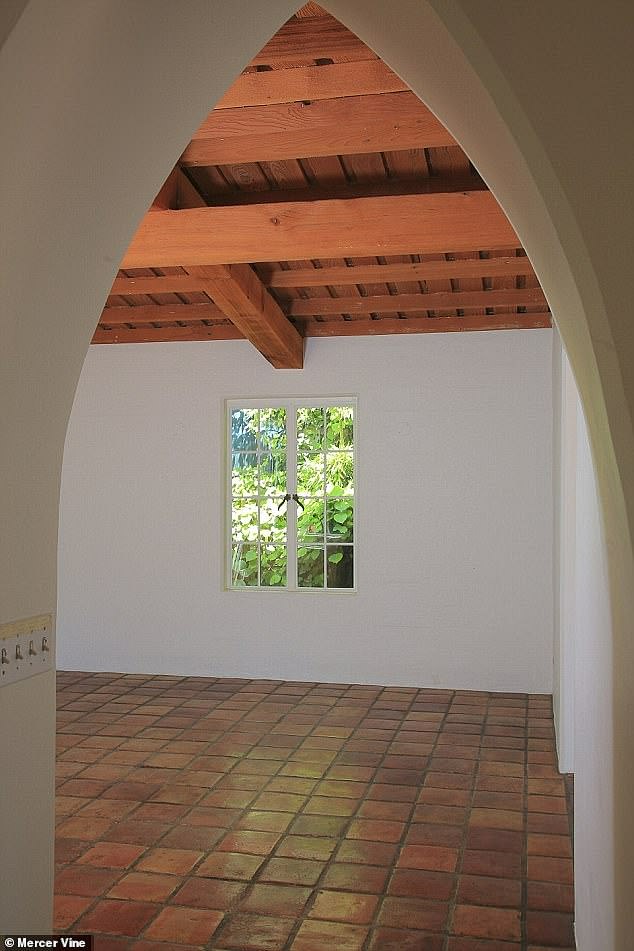 The house features beamed ceilings, terracotta tiled floors and casement windows