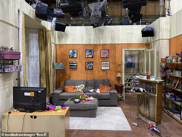 Frozen in time: One photo shows the Slater household with the photos still in the fall and Stacey's son Arthur's toys on the floor