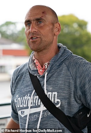 Busto was pictured following a court hearing in the Hamptons on Aug. 25