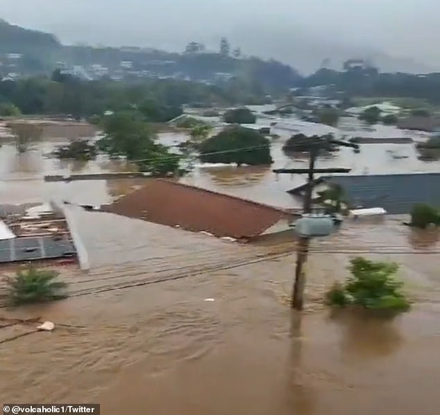 1693970584 659 Brazil cyclone Incredible moment cop saves a family from the