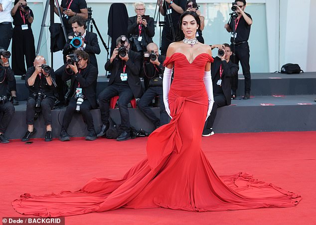 Wow!  Cristiano Ronaldo's girlfriend, 29, looked sensational in a floor-length red dress with an off-the-shoulder bust