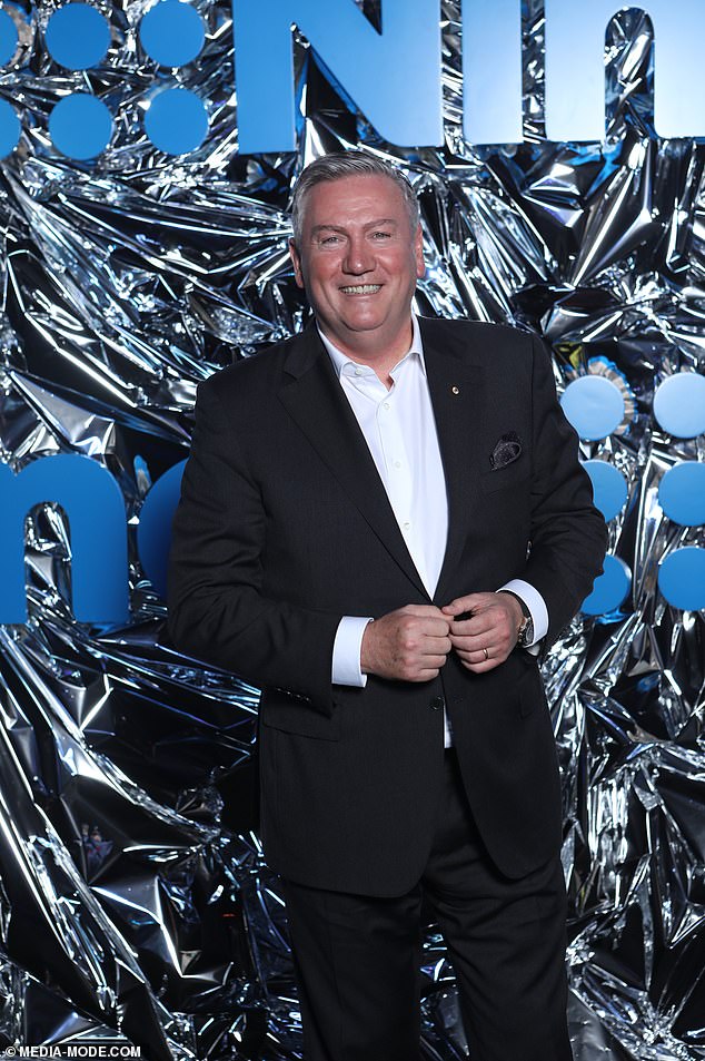 Eddie McGuire, 58, opted for a black suit with a pocket square, which he paired with a crisp white shirt for the event