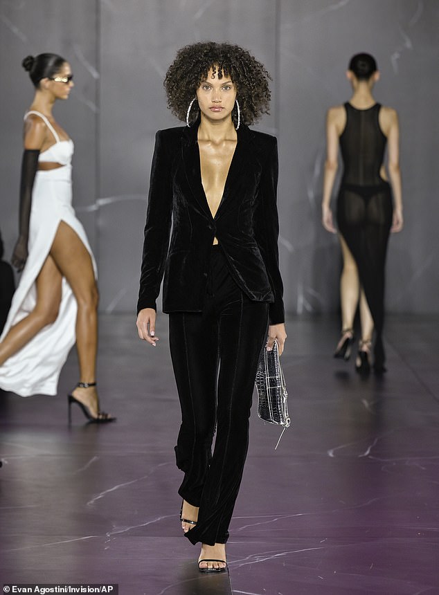 A model walks the catwalk Tuesday evening at the launch of the PrettyLittleThing x Naomi Campbell collection in New York