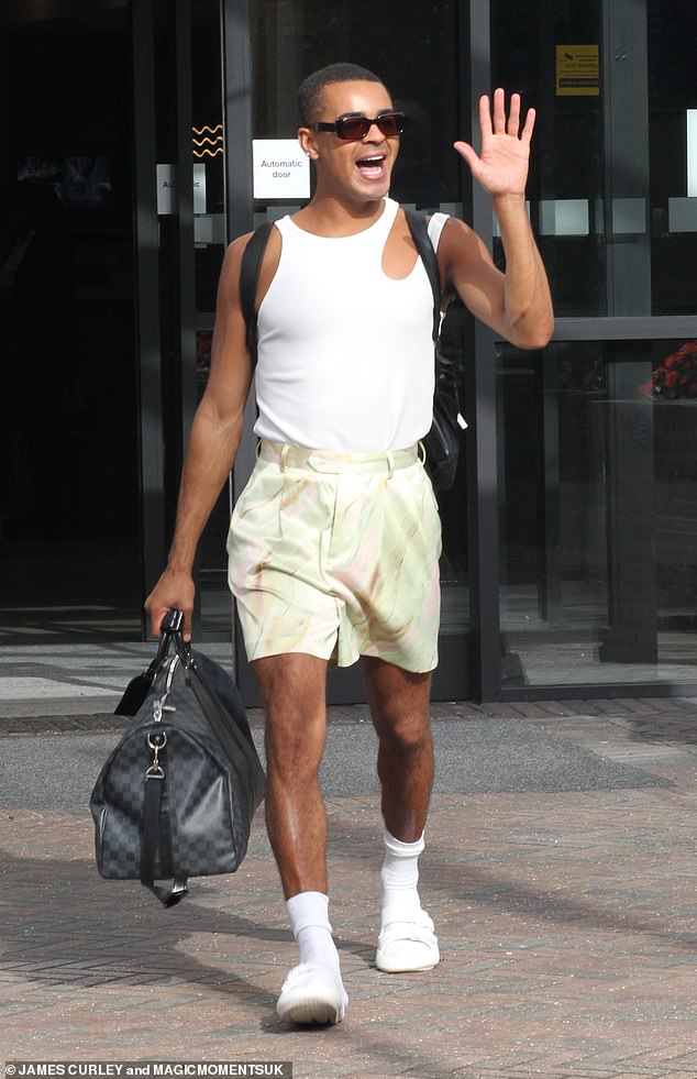 Ready to go: Strictly professional Layton Williams, 28, seemed in high spirits as he waved to the cameras as he left rehearsals