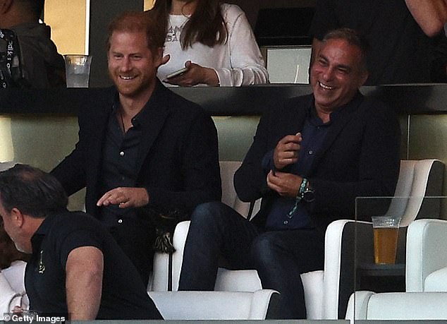 Prince Harry (left) sits next to Hollywood venture capitalist Adam Lilling (right) in a box at BMO Stadium as he watches Los Angeles FC play against Inter Miami in a football game on Sunday