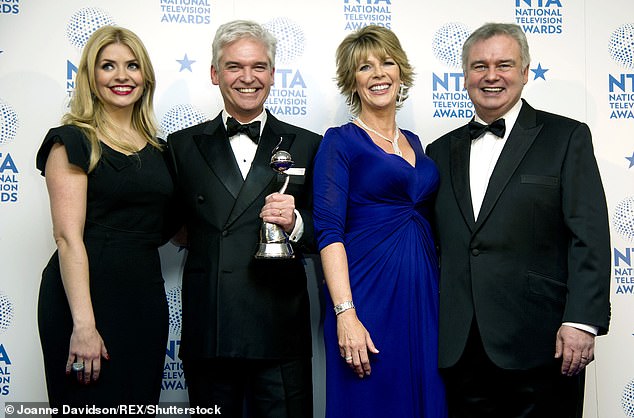 War: The broadcaster, who has had a fraught relationship with ITV since his contract ended, was quick to joke about losing the show (pictured with Holly, Phil and wife Ruth in 2013)