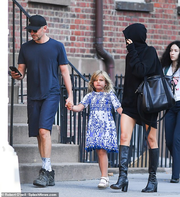 With their adorable daughter: The Vogue model was accompanied by her ex-partner Bradley Cooper.  They dropped off their six-year-old daughter Lea for her first day of school