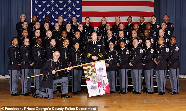 Marlett, pictured with the flag, has been suspended three times since leaving the academy in 2014