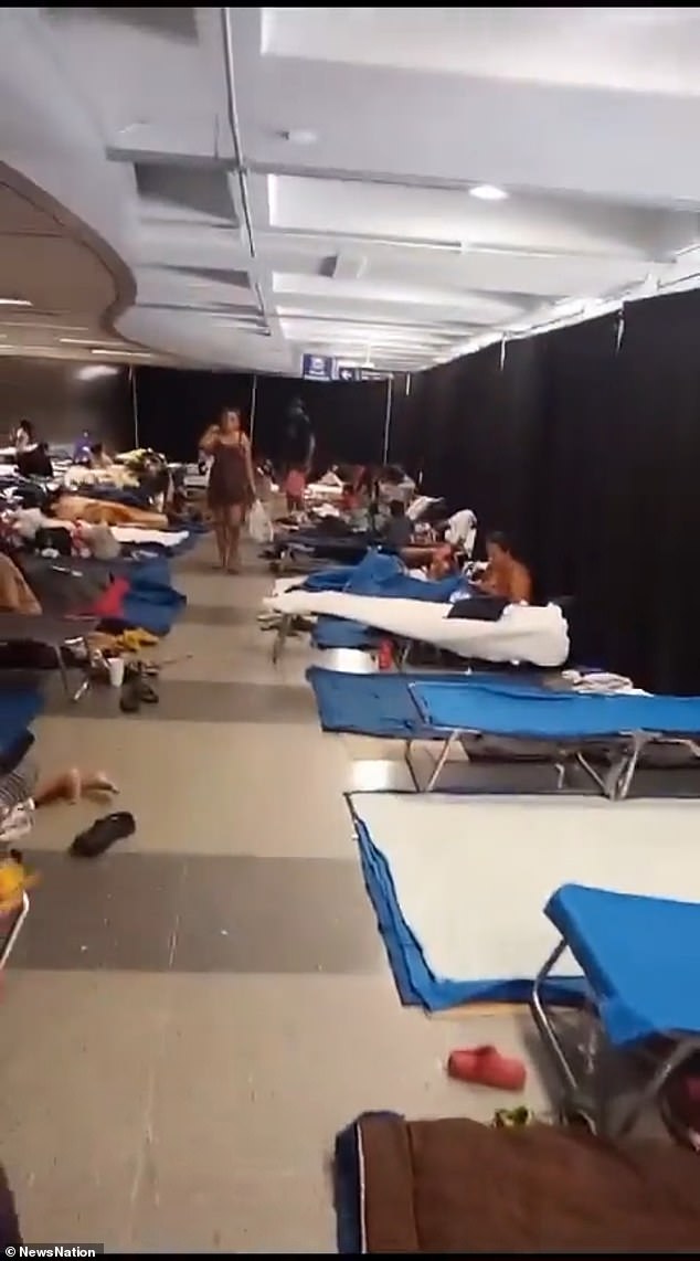 Currently, 433 migrants are seeking shelter at the airport, forced to sleep on the floors behind black curtains used to hide the deteriorating humanitarian situation.