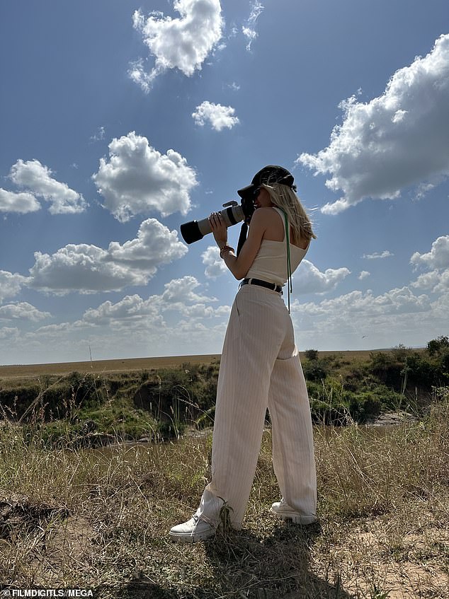 Casual shoes: She traded her usual sky-high stilettos for white, high-tops