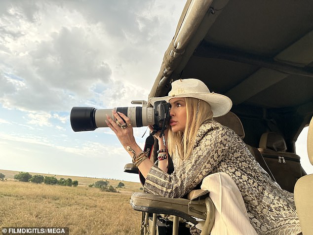 Snakeskin: In some photos she wore a black and white snakeskin print jacket over the top and pants