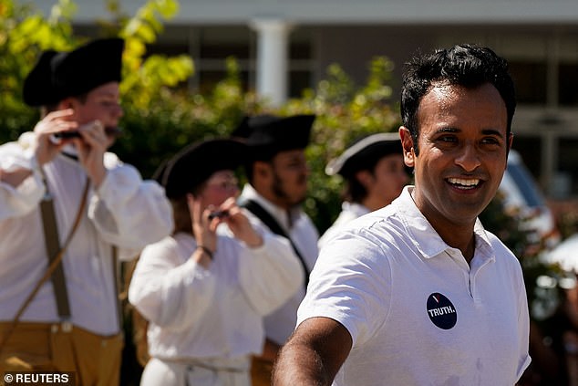 Biotech CEO Vivek Ramaswamy is also campaigning in New Hampshire – above he is at the Labor Day Parade in Milford