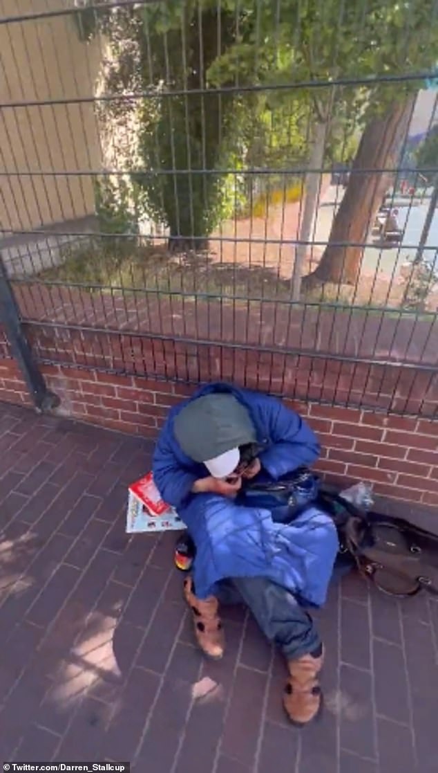 Next you will see people smoking drugs along the wall directly adjacent to the playground, where children were seen and heard in broad daylight