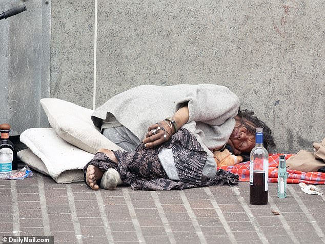 A homeless person on the streets of Union Square in San Francisco