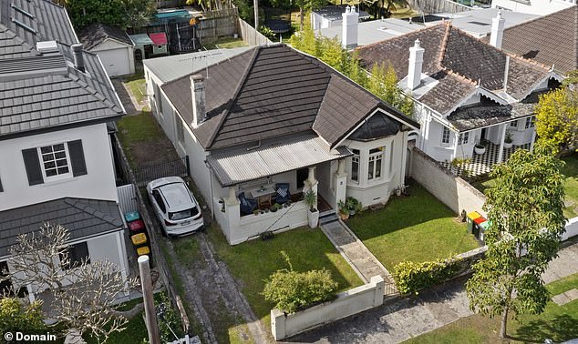 The detached house has a combined bathroom/laundry room and a 'four-car' gravel driveway and was on the market for just a week before being sold ahead of its scheduled auction