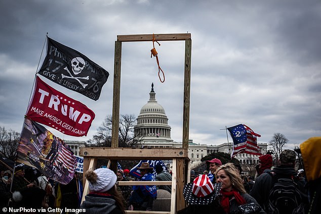 Trump supporters surround a noose and gallows near the Capitol on Jan. 6