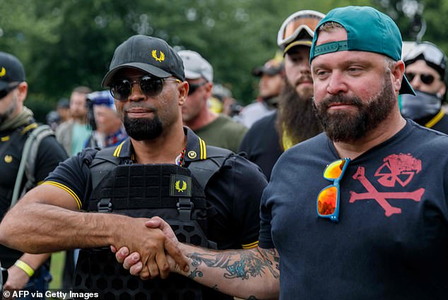 Proud Boys leader Enrique Tarrio (pictured with co-defendant Joseph Biggs) was found guilty of seditious conspiracy following the January 6, 2021 riot