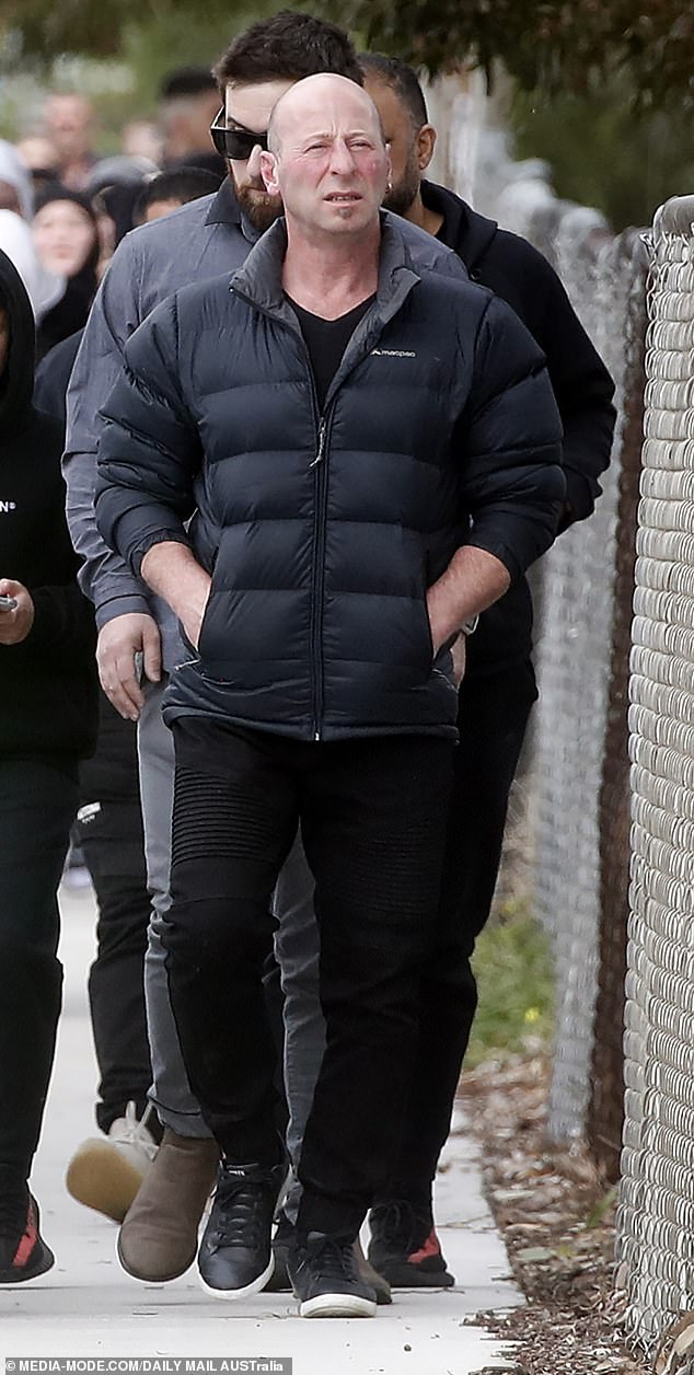 Mourners pour into the Australian Islamic Center in Newport on Thursday